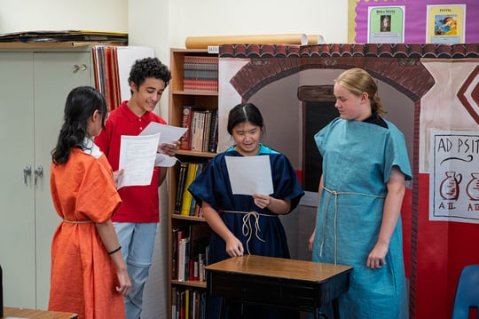8th Grade Students Perform In Latin